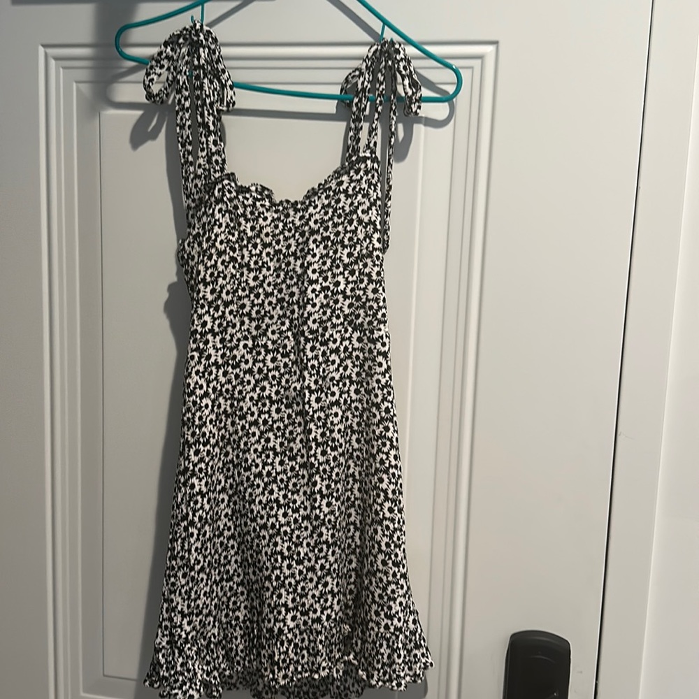 Lulu’s Black and White Tie Shoulder Zip Back Fully Lined Mini Dress